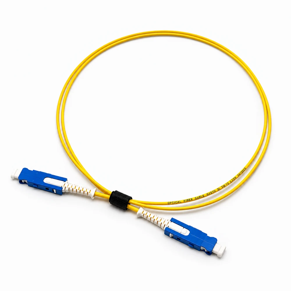 Yellow SN-to-SN fiber assembly with blue connectors and white push-pull boots